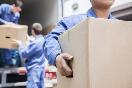 Office relocation planning in Monken Hadley with crates and moving team
