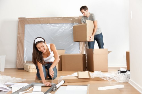 House removalists working in a Monken Hadley residential street