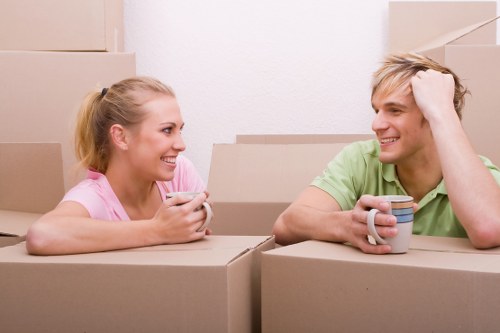 Packed boxes and furniture ready for a house move in Monken Hadley