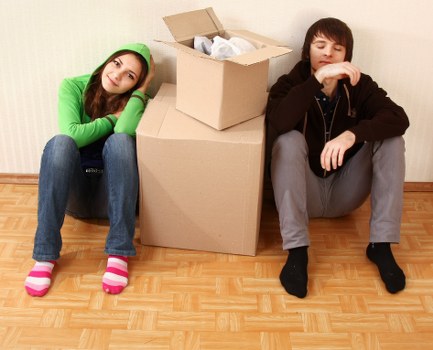 Movers unloading boxes at a Monken Hadley property