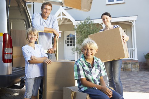 A local packing team preparing fragile items for safe transport and unpacking